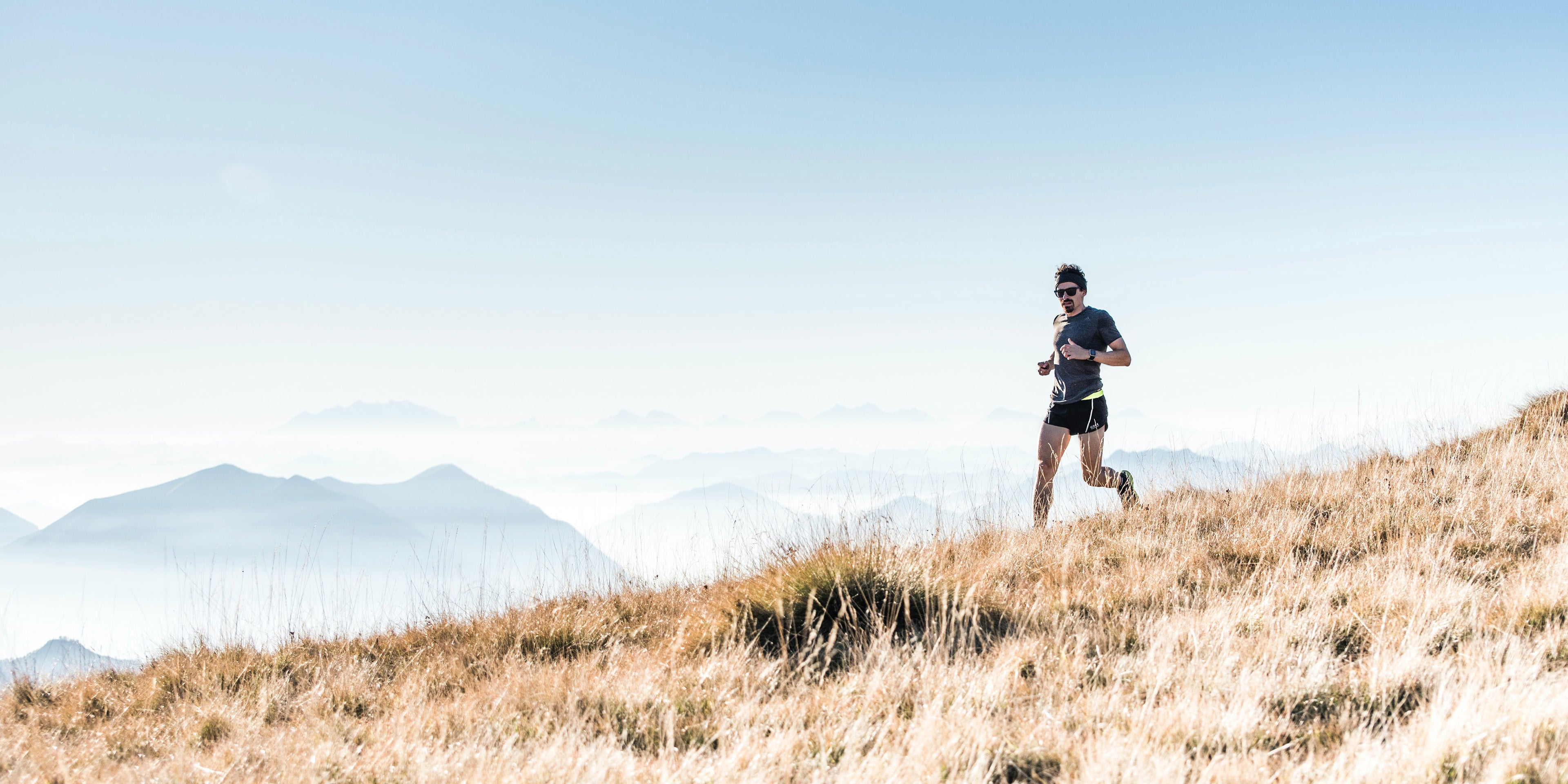 person running on a hillside